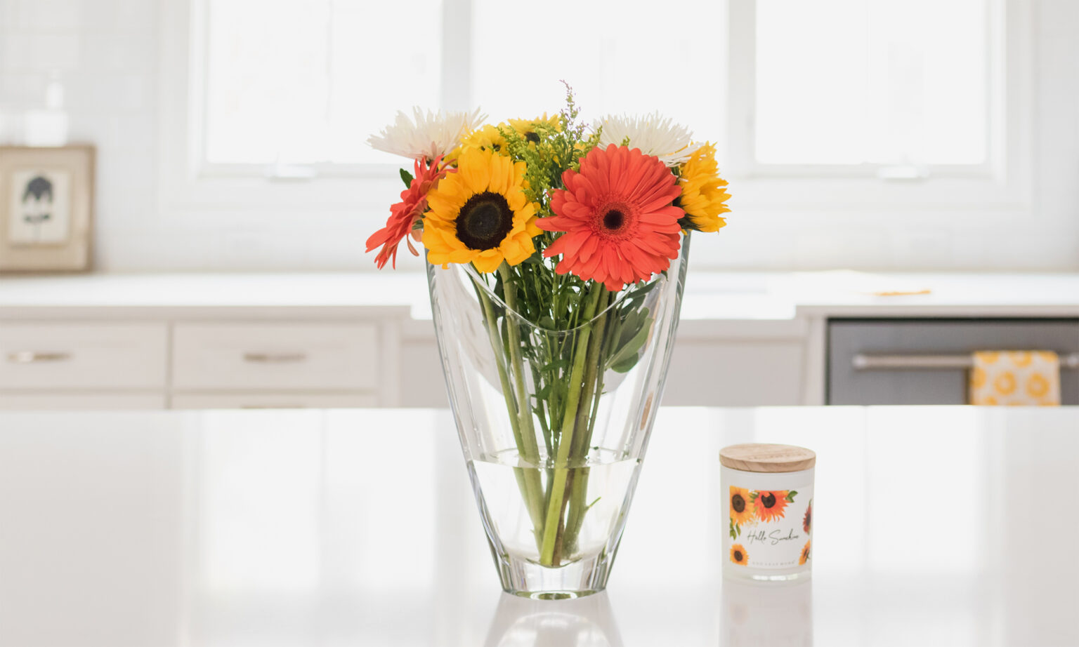 Brightly colored fresh flowers in clean kitchen